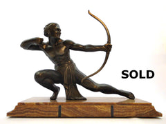 Large Male Archer Sculpture mounted on a marble base measuring 60 cm  23.62" long. Spelter with a beautiful bronze patina. Signed SALVATORE MELANI  1920-1930's.