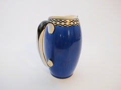 Blue Pitcher with Black & White Checkered pattern