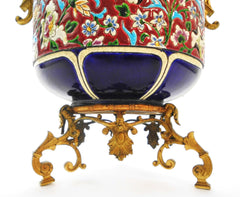 Ceramic Jardinière/Centerpiece Emaux de Longwy France end of 19th Century. Typical "Cloisonné" Flower decor combined with a decoration in "Bleu de Sèvres". Mounted on a bronze support.