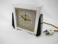 TEMCO  Art Deco Electric Mantel Clock  Plated Silver and black Bakelite. 200-250 Volt 50 Cycles.