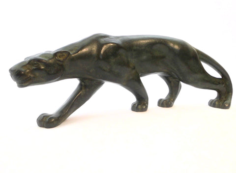 Elegant crouching Panther ready to strike, created by Secondo in France around 1930. Bronze, finished with a green patina.