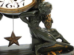 Impressive Clock in green patinated Spelter on a Portoro Marble Base. Designed by the famous Belgian Sculptor Georges Van de Voorde. This Masterpiece named "L'Etoile" (Star) was presented at the select "Salon des Artistes Français" in Paris around 1920.