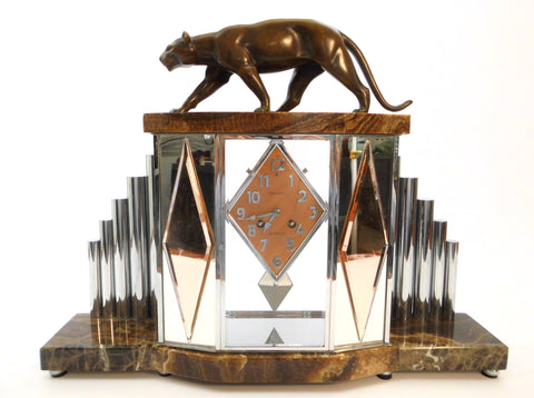 Bronze Panther Clock Set by Michel Decoux, France around 1910. Art Deco Cubist French Clock set with a 6 side Glass Clock case, mounted on a brown marble base with stepped chrome tubing.